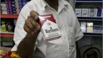 Neighbourhood grocery stores appear to be less stringent in checking IDs of cigarette buyers. Jaime Puebla / The National