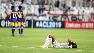 Al Wahda's Tahnoon Alzaabi after their Asian Champions League quarter-final defeat to Saudi Arabian side Al Nassr last season. Chris Whiteoak / The National