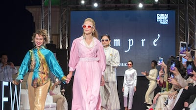 Sempre designer receives applause. Photo: Leslie Pableo for The National