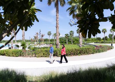 Prospective house buyers stroll around a residential community in Dubai that developer Damac has aimed at retired people. Reem Mohammed / The National