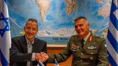 Israel's Maj Gen Amir Baram, right, and Maj Gen Ioannis Bouras, representing Greece, at the signing ceremony in Tel Aviv. Photo: Israeli Ministry of Defence