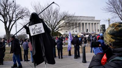 A protester dressed as the Grim Reaper participates in an anti-vaccine rally in front of the Lincoln Memorial in Washington, US. AP