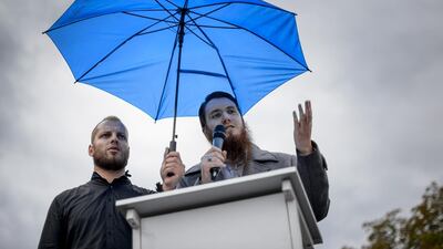 President of the Islamic Central Council of Switzerland Nicolas Blancho (R) has been given a suspended sentence for spreading Al Qaeda propaganda. AFP PHOTO / FABRICE COFFRINI