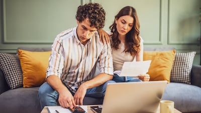 Both partners must review the family’s overall financial situation at least once a year. Getty Images