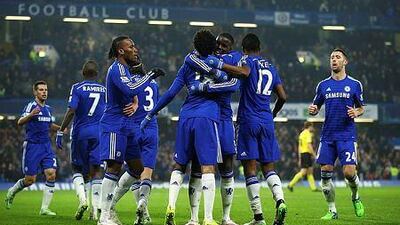 Kurt Zouma, centre, is congratulated for his goal during Chelsea's 3-0 FA Cup third round victory over Watford on Sunday.