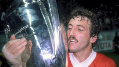 Goalscoring hero Alan Kennedy kisses the trophy after the 1981 final. Getty