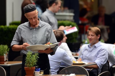 About 40 per cent of hospitality venues in England have access to an outdoor area. AFP