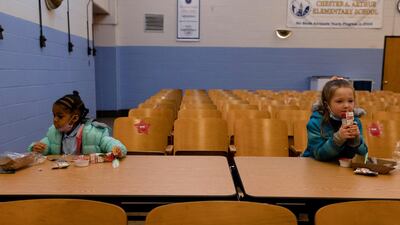 Pupils eat lunch at school as Covid-19 restrictions are lifted in Philadelphia, Pennsylvania, USA. Reuters