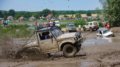 A driver tackles the course. EPA