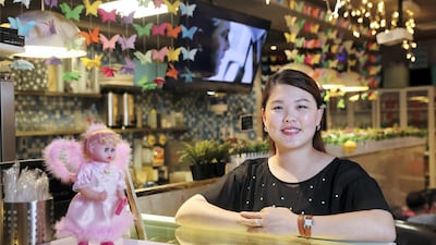 Dubai, United Arab Emirates - October 15, 2018: Chinese entrepreneur Yanying Jiang at the Friendship Cafe, a coffee shop she started in International City that sells mainly fresh Asian sweets to a largely Chinese community. Monday, October 15th, 2018 in International City, Dubai. Chris Whiteoak / The National