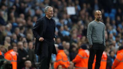 Manchester United manager Jose Mourinho, left, has no problems with Manchester City counterpart Pep Guardiola. Russell Cheyne / Reuters