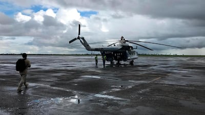 A UN humanitarian helicopter prepares for a day of work at the airport in Beira. AP Photo