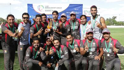 The UAE cricket team celebrate winning the World Cricket League Division 2 title after beating Nepal in the final in 2018.