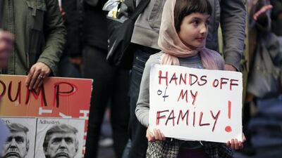Rosalie Gurna, 9, joins hundreds of protesters denouncing the US ban on travellers from Muslim-majority countries outside Los Angeles International Airport on January 28, 2017. Eugene Garcia / EPA