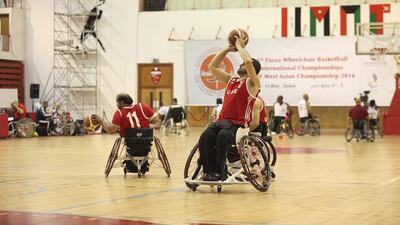The UAE's men's wheelchair basketball team in action against Jordan at Al Ahli Sports Club in Dubai. Lee Hoagland / The National