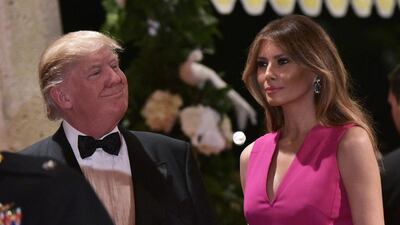 Donald Trump, pictured here with his wife, Melania Trump, on February 4, 2017. Reports Kuwait had 'mirrored' the US president's ban on travellers from seven mainly-Muslim countries prompted him to respond with 'Smart!'. Mandel Ngan / AFP
