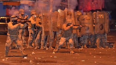 Lebanese soldiers fire rubber bullet and tear gas at anti-government protesters amid clashes in the northern port city of Tripoli. AFP