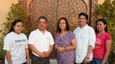 From left, Matilyn Bagunu, Alan Bacason, Letty Samuel, Manuel Cordova and Leny Alzaga at the Philippine consulate in Dubai.