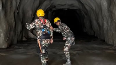 Rescuers are searching for the 933 workers believed to be trapped across 11 hydropower projects in Nepal. AFP