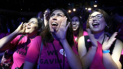 Shanna Niroumandzadeh, center, celebrates as Lt. Gov Gavin Newsom, a Democrat, is declared the next California governor. AP Photo