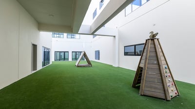 The outdoor playground for young learners at Queen Elizabeth’s School