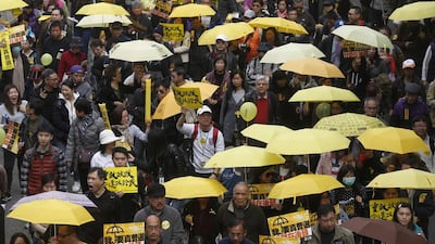 Pro-democracy activists take part in a march to Central, demanding for universal suffrage in Hong Kong. Kin Cheung / AP Photo
