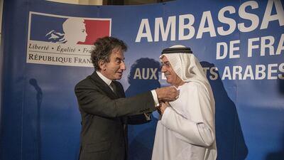 Dr.Zaki Nusseibeh (R), is decorated with the Légion d’honneur in the Residence of France in Abu Dhabi by Jack Lang (L), Former French Minister of Culture and Current President of the Institute of the Arab World. Vidhyaa for The National