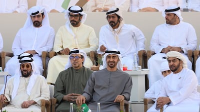Sheikh Mohamed with Sheikh Mansour bin Zayed, Deputy Prime Minister and Minister of the Presidential Court; Sheikh Tahnoon bin Mohamed, Ruler's Representative in Al Ain Region; and Sheikh Hamdan bin Zayed, Ruler’s Representative in Al Dhafra Region, watch the Union Parade, during the Sheikh Zayed Heritage Festival. Abdulla Al Neyadi / Presidential Court