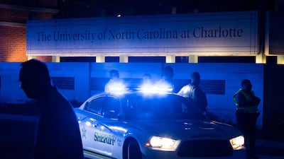Police secure the main entrance to UNC Charlotte after a fatal shooting at the school, Tuesday, April 30, 2019, in Charlotte, N.C. AP