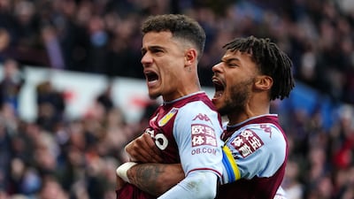 Aston Villa's Philippe Coutinho celebrates scoring with teammate Tyrone Mings. PA