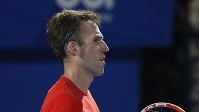 epa05069144 Ivo Karlovic of Philippine Mavericks reacts after winning against Roger Federer of OBI UAE Royalsduring their match of the International Premier Tennis League (IPTL) at Dubai Duty Free Tennis Stadium in Dubai, United Arab Emirates on 14 December 2015. EPA/ALI HAIDER