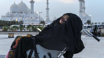 Munira Abdulla, who has woken from a 27-year-long vegetative state, visited the at Sheikh Zayed Grand Mosque, which was built 16 yeas after a road crash left her in a coma. Khushnum Bhandari for The National