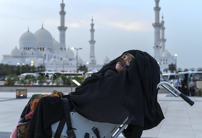 Munira Abdulla, who has woken from a 27-year-long vegetative state, visited the at Sheikh Zayed Grand Mosque, which was built 16 yeas after a road crash left her in a coma. Khushnum Bhandari for The National