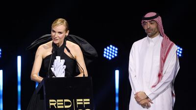 Kruger on stage after receiving an honourary prize