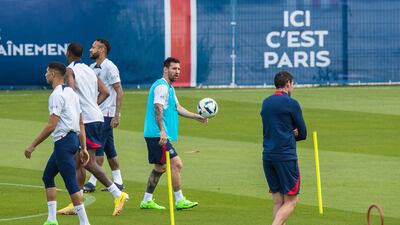 Lionel Messi takes part in a training session at the Camp des Loges sports complex. EPA