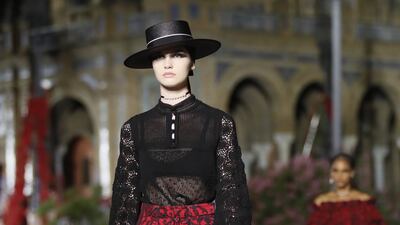 A sheer lace top and shorts at the Dior Cruise 2023 collection. EPA