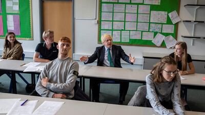 Britain's Prime Minister Boris Johnson visits Castle Rock school on the pupil's first day back to school, in Coalville, Britain August 26. Jack Hill/Pool via Reuters