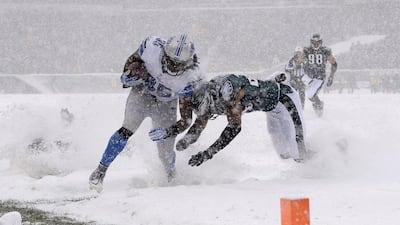 Detroit running back Joique Bell runs toward the end zone in Philadelphia. Michael Perez / AP