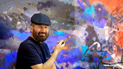 The Emirati artist Abdul Qader at his home studio. Victor Besa for The National.
