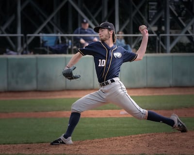Ollie Duthie, seen here pitching during matches at the University of British Columbia, became the first Dubai-born student to play baseball at college level in North America. Photo: Roger Duthie