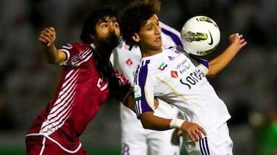 Al Ain's Omar Abdulrahman, right, spent two weeks on trial at Manchester City recently. Christopher Pike / The National