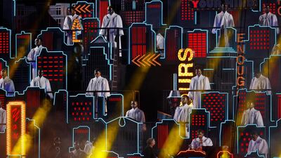 The Weeknd was flanked by a choir for much of the performance. Reuters