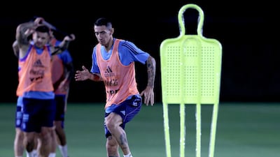 Angel Di Maria of Argentina warms up during the training session at Qatar University. Getty