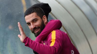 Barcelona’s Turkish forward Arda Turan arrives for a training session at the Sports Center FC Barcelona Joan Gamper in Sant Joan Despi, near Barcelona on April 1, 2016 on the eve their Spanish La Liga Clasico football match FC Barcelona vs Real Madrid. AFP / LLUIS GENE