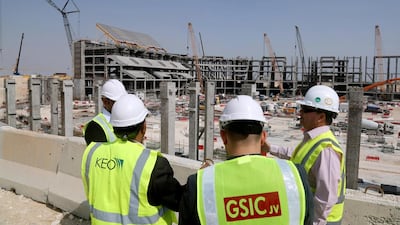 Above, a construction site north of Doha. Complaints from consultancy firms about late payments is on the rise, with conditions in Qatar and Saudi Arabia becoming 'markedly worse' over the past 12 months. Ibraheem Al Omari / Reuters