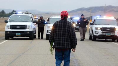 A protester blocks a highway in Mandan during a protest against plans to pass the Dakota Access pipeline near the Standing Rock Indian Reservation, North Dakota, last week. Stephanie Keith / Reuters