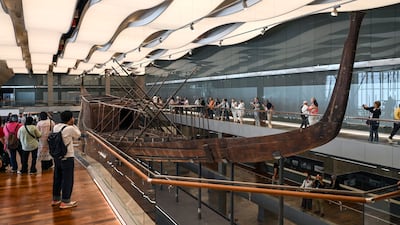 Visitors walk inside the Khufu's Boats Museum, part of the Grand Egyptian Museum complex. EPA