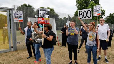 Protesters gather near an entrance Winfield House. AFP