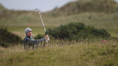 Jordan Spieth of the US plays his second shot on the 15th hole during the second round of the Open Championship on Saturday before play was again interrupted by strong winds. Paul Childs / Action Images / Reuters / July 18, 2015