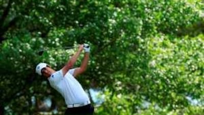 Matteo Manassero watches a shot during the third round of the Masters yesterday.